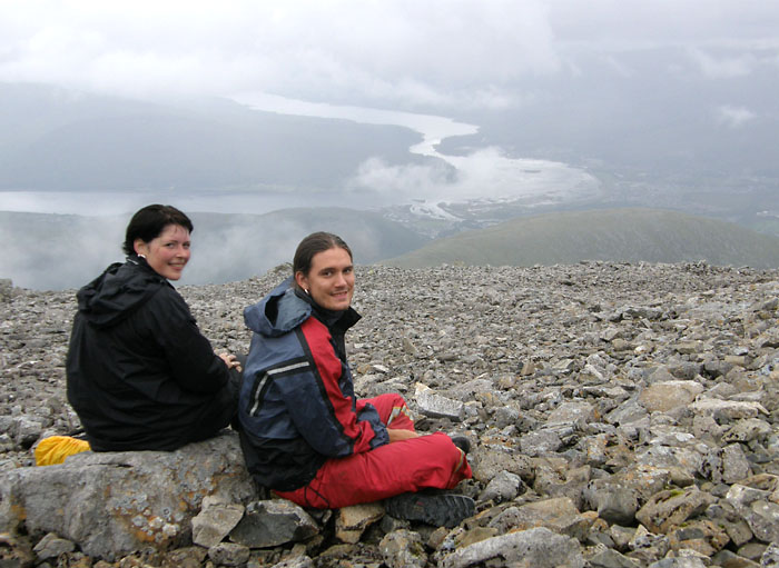 Signe and Arn on Ben Nevis with view of Fort William